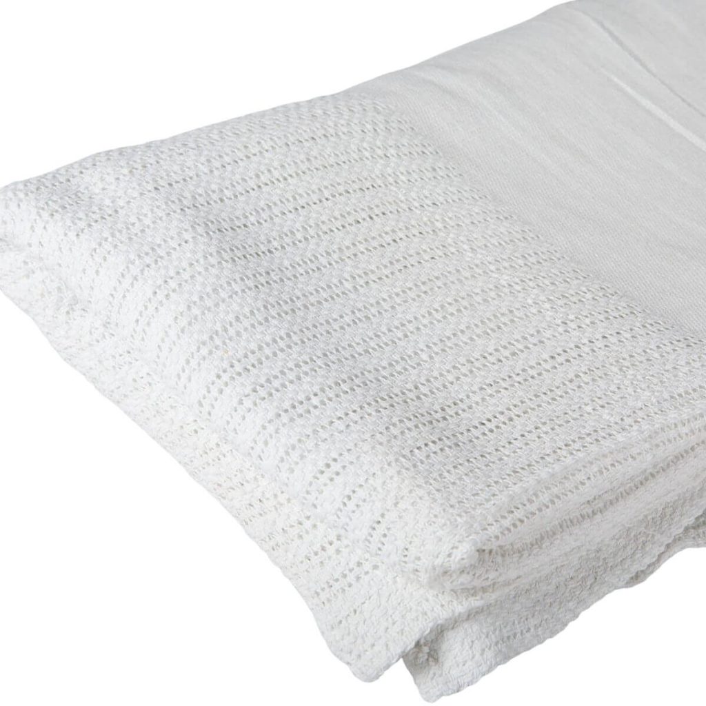 Cellular cot blanket in cotton Interweave Healthcare