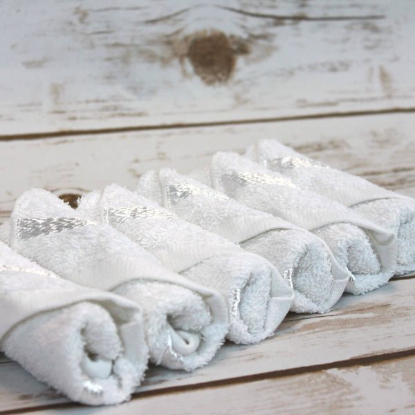 Cold or hot towel set in tray with tweezers